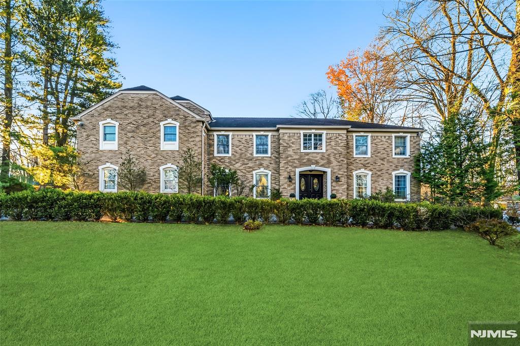 Welcome to this beautifully updated residence set on a quiet, tree-lined street in the heart of Old Tappan, located within the townâ€™s highly sought-after Blue Ribbon school district. The elegant living room is highlighted by a striking brick fireplace that serves as a refined focal point, adding warmth and timeless character. The renovated kitchen features custom cabinetry, sleek countertops, and stainless steel appliances, opening seamlessly to the dining and living areas for an ideal flow suited to both daily living and entertaining. Skylights throughout the home fill the interior with abundant natural light, enhancing the bright and airy ambiance. Recent upgrades include a new central AC system for year-round comfort. Well-appointed bedrooms offer flexibility for a variety of lifestyle needs. The private backyard is a true retreat, complete with a swimming pool and basketball court, perfect for entertaining, recreation, and relaxation. Ideally located near top-rated schools, parks, shopping, and transportation, this home offers a refined blend of comfort, convenience, and elevated living.