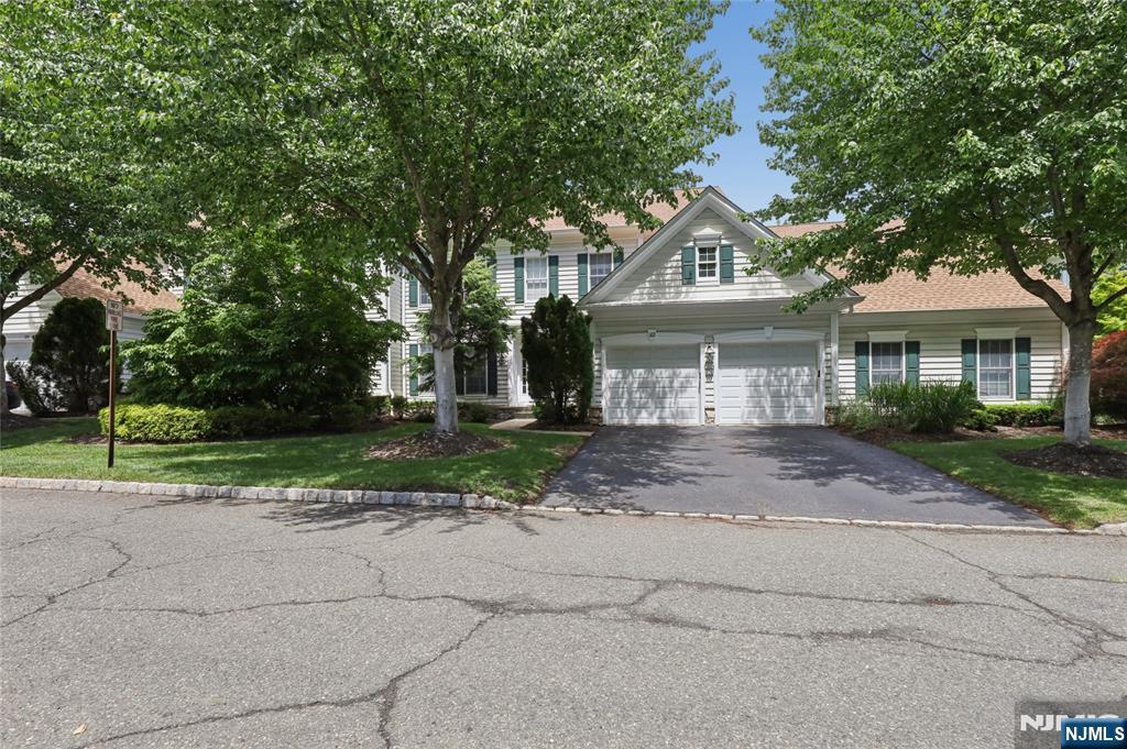 Conveniently located this owner occupied unit was never used as rental and has been lovingly maintained by a couple. Largest model in community with 2 story entrance, formal living room to your left formal dining room to your right, family room straight ahead connected to eat in kitchen with center island, pantry and laundry room leading to 2 car garage. Private deck off of kitchen. In addition there is an office and powder room. Second floor is luxuriously carpeted with double doors to primary bedroom suite w/ tray ceiling, sitting/ office/ nursery area. Primary bathroom with jetted tub, separate shower stall, water closet, double vanities and walk in closet and linen closet. Two additional bedrooms with hall bathroom. complete this floor. Basement comes with high ceilings carpeted, spacious recreation room, extra room to use as office, full bathroom and lots of storage. Brettonwoods community is highly sought after as all the school buses are available to your children, NYC bus during rush hour is on Century Blvd. and close to shopping and highways.