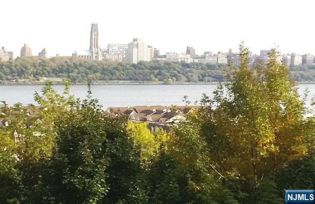 SUN FILLED UNIQUE APARTMENT WITH GREAT N.Y.C. AND HUDSON RIVER VIEWS. LOCATED ON THE TOP FLOOR OF A TWO FAMILY, IN THE HEART OF TRENDY EDGEWATER. OPEN LAYOUT WITH SEPARATE EAT-IN KITCHEN, BEAUTIFUL HARDWOOD FLOORS THROUGHOUT, RENOVATED TILED KITCHEN AND BATHROOM, WASHER&DRYER, DISHWASHER, GAS STOVE AND MODERN CABINETS. ENJOY LARGE PRIVATE DECK. IDEAL AS A WORKPLACE FOR A CREATIVE PERSON. APPROX. 650 SQ. FT, ONE PARKING SPACE INCLUDED. JUST A SHORT WALK TO N.Y.C. TRANSPORTATION, FERRY, WHOLE FOODS, TRADER'S JOE, RESTAURANTS AND MORE. ONE YEAR LEASE, AVAILABLE APRIL 20TH, CREDIT REPORT, PROOF OF INCOME. NO SMOKING, NO PETS ALLOWED.