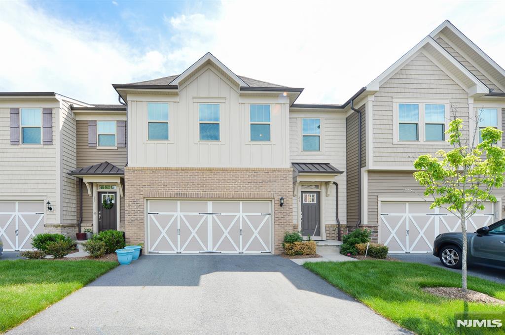 WELCOME TO THE DESIRABLE GABLES OF WOODCLIFF LAKE! LUXURY TOWNHOUSE LIVING AT ITS BEST! THIS TOWNHOME WAS BUILT IN 2019. EAT-IN KITCHEN WITH GRANITE COUNTERS, STAINLESS STEEL APPLIANCES, CENTER ISLAND & PANTRY. FORMAL DINING ROOM & LIVING ROOM ALL IN AN OPEN CONCEPT. BALCONY OVERLOOKING PRIVATE TREE LINED AREA WITH GRASS. POWDER ROOM & GLEAMING HARDWOOD FLOORS THROUGHOUT FIRST FLOOR. SECOND FLOOR OFFERS GRAND PRIMARY SUITE WITH SITTING AREA & BALCONY. PRIMARY BATH WITH TWO VANITIES & OVERSIZED SHOWER. TWO WALK-IN CLOSETS. TWO ENSUITE BEDROOMS WITH WALK IN CLOSETS. LAUNDRY LOCATED ON SECOND FLOOR FOR EASY USE. LARGE FULL BASEMENT WITH HIGH CEILINGS READY TO BE FINISHED FOR ADDITIONAL LIVING SPACE WITH ROUGH PLUMBING FOR A BATHROOM & STORAGE. TWO CAR GARAGE. THE GABLES IS CONVENTIENTLY LOCATED CLOSE TO ALL SHOPPING, DINING & ALL MAJOR HIGHWAYS.