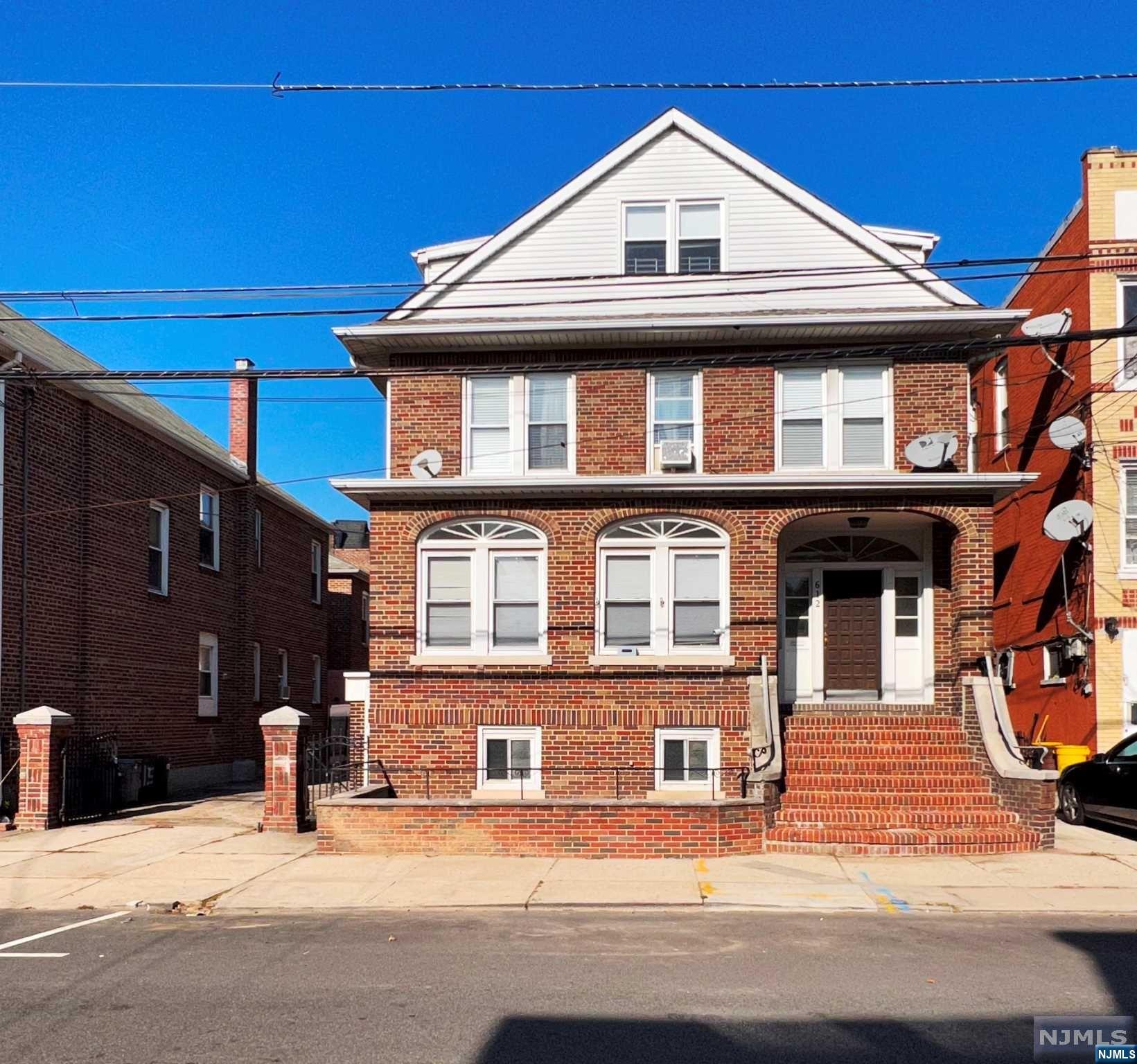 This is an amazing opportunity to own a fantastic one of a kind investment property in upper North Bergen's Racetrack section. Located between James Braddock Park and Kennedy Boulevard. This solid brick 3-family home has lots of potential. It features 3 large apartments with plenty of light. Each apartment has hardwood floors throughout, 3 bedrooms, eat in kitchen, formal dining room, living room, sun porch and full bath. Apt #1 has an updated kitchen and Apt #3 has an updated bathroom. The semi-finished basement is huge with very high ceilings and a full bathroom and a separate entrance. This home has a back entrance for each apartment including the basement. It also has a large driveway with 4 garages. Close to all major transportation, schools, shops and parks. A dream for NY commuters, a must see.