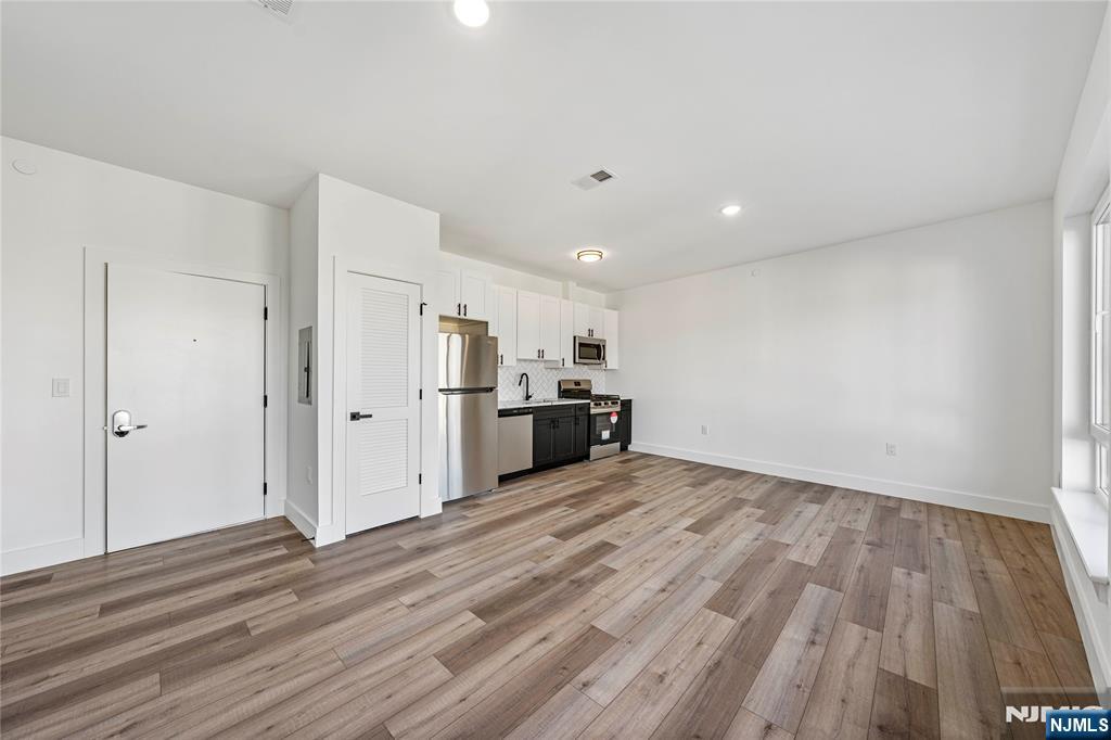 Discover 16 brand-new luxury apartments featuring spacious 2-bed, 1-bath units, large windows, stainless steel appliances, and in-unit washer & dryer. Enjoy secured entry, a package room, and a pet-friendly policy ($50/month fee). Conveniently located near NYC & Newark Penn Station.Schedule a tour today! Agent Remarks: MOVE IN MARCH 1ST. All background/credit check applications to go through listing office. TENANT REQUIREMENTS: Gross income 2.4X monthly rental amount, minimum credit score of 600, Security Deposit 1.5Xmonthly rent. See link to background/credit check application under Media.