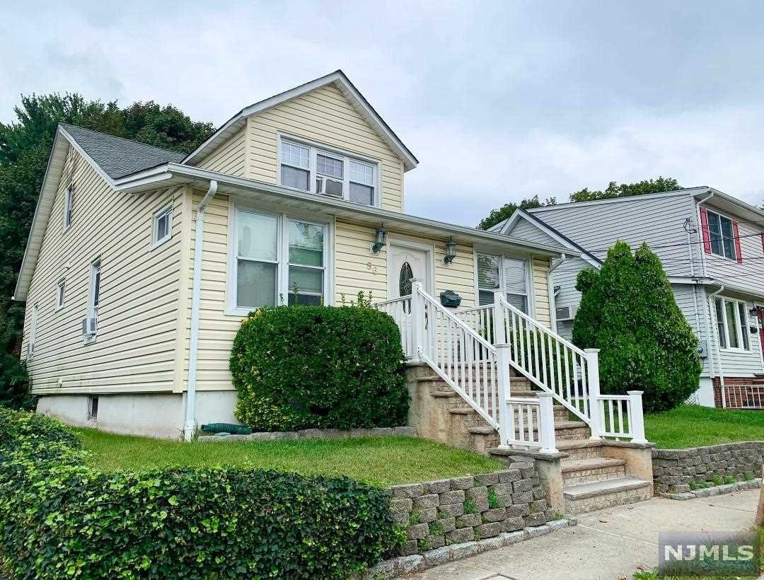Rare find with 2 separate living areas! Upon entering, you're greeted by the most perfect mudroom/sitting rm w/hdwd floors & 9ft ceilings. From there, walk through the living rm & into the large formal dining rm also w/9ft ceilings & hdwd floors. Just off the dining rm is a hallway that leads to Bedroom 1 w/an outcove suitable for a small office/nursery OR turn it into a huge walk-in closet. Bedroom 2 is just across the hall from the 1st w/full bath in between. The kitchen is off the dining rm as is a set of stairs that lead to 2 more bedrooms, 2nd full bath, 4 walk-in closets & more closets. Yes, 4 walk-in closets! Upstairs could also be used as in-law or master suite. The full, partially-finished basement hosts a rec rm, laundry rm, 3rd full bath & office/exercise rm & more closets! Close to dwntwn w/shops, eateries, conven & grocery stores, schools, houses of worship, parks, malls, major hwys & public trans. Must see, schedule a showing today!