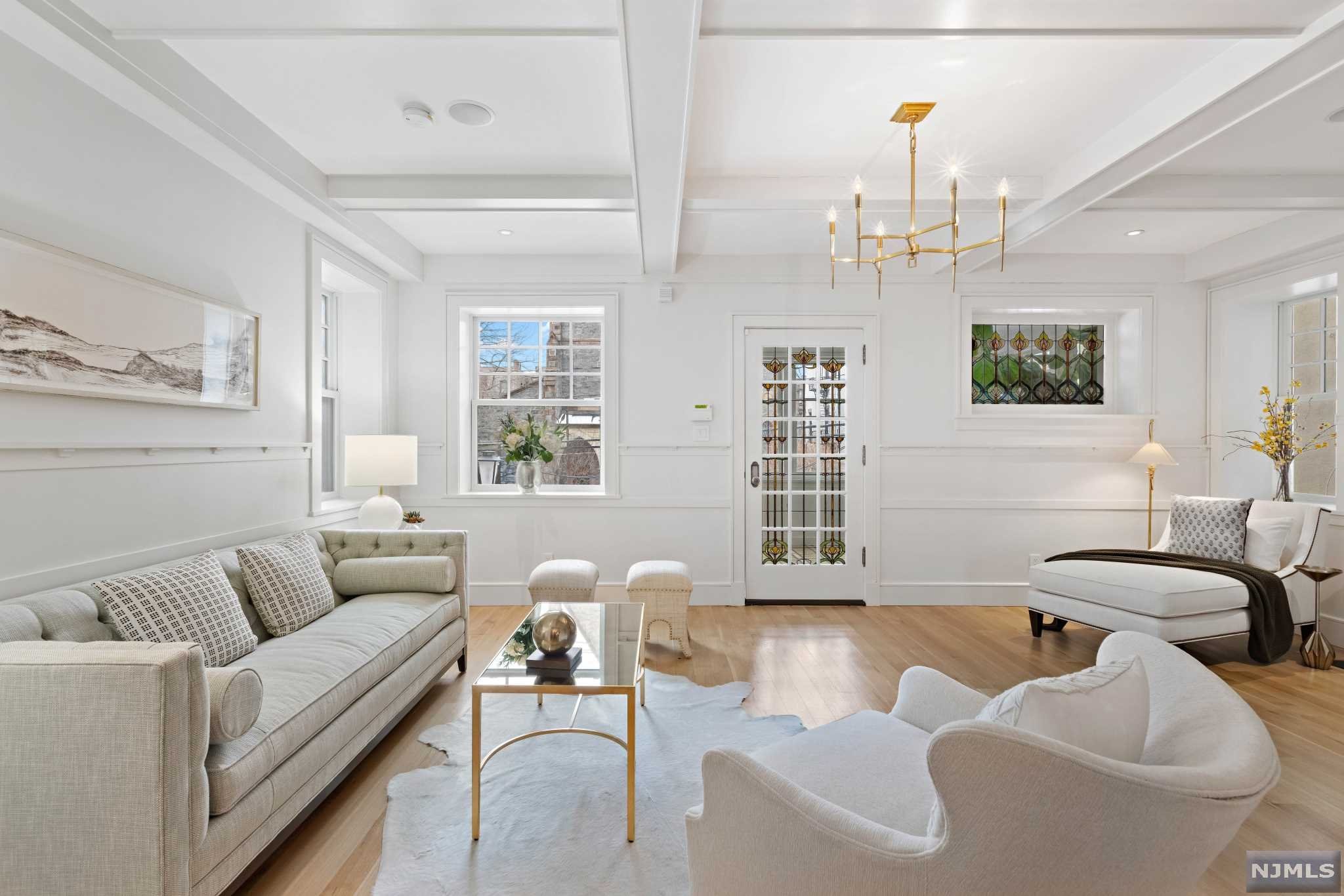 Situated on 29.25 x 100' lot, w/ over 5200SF, spanning over 4 fls, this 6BD, 5 1/2BA home has undergone a complete & extensive 2yr renovation, including an extension that added over 2000SF The gourmet kitchen features custom cabinetry, large peninsula w/ Cosatino Carrera marble and Wolf, SubZero & Miele appliances. 2nd fl features large custom master suite complete w/ walk-in closet, dressing area & custom built-ins. The master bath features Waterworks fixtures & tile, double vanity w/ Cosatino Carrera marble, as well as a restored claw foot tub. The 2nd fl also has another full bedroom w/ ensuite bath, a private home office & an additional washer/dryer. The 3rd fl of the home has 3 more bedrooms, 2 additional bathrooms & a walk-in closet. The garden level entrance w/ mudroom, family room w/ wet bar, a large laundry room w/ additional storage, another full bathroom & separate flex room. 1 yr of paid rental parking included w/ sale. Backyard offers bluestone patio area & gas to BBQ