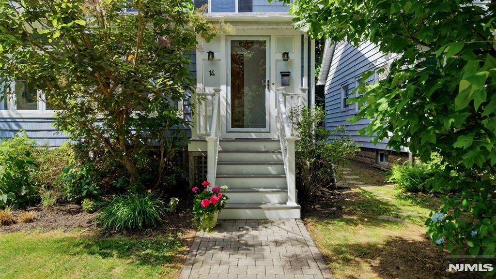 Step into this charming 3-bed, 2.1-bath home where every space feels inviting and easy to love. Freshly painted and full of personality, it's the kind of home you might overlook from the street, until you're inside and realize how much it offers.The first floor features a bright living area, an updated kitchen, and a super-convenient (and pretty!) half bath. Just off the main living space is a cozy sunroom, perfect as an office nook, reading corner, or extra sitting area. A second living room sits at the back of the home and opens directly to the beautifully maintained deck, creating an easy indoor-outdoor flow for relaxing or entertaining. Upstairs, the three bedrooms include a comfortable primary bedroom with its own full bathroom, offering privacy without overstating the space.The finished basement adds even more flexibility, currently used as a teen hangout and bedroom-style space equipped for late nights of video gaming and tv streaming. It can easily function as a rec room, home gym, office, extra living space or creative area depending on your needs. Laundry room being separate and tucked away is an added plus. The location is all about convenience: half way down the road from Glen Ridge and .5 miles to Watchung Plaza with the train, shops and restaurants. Commuting choices are abundant! Plus, Brookdale Park nearby for weekend strolls. A freshly updated, easy-to-love home in a prime spot, ideal for first-time buyers ready to plant roots in Montclair.