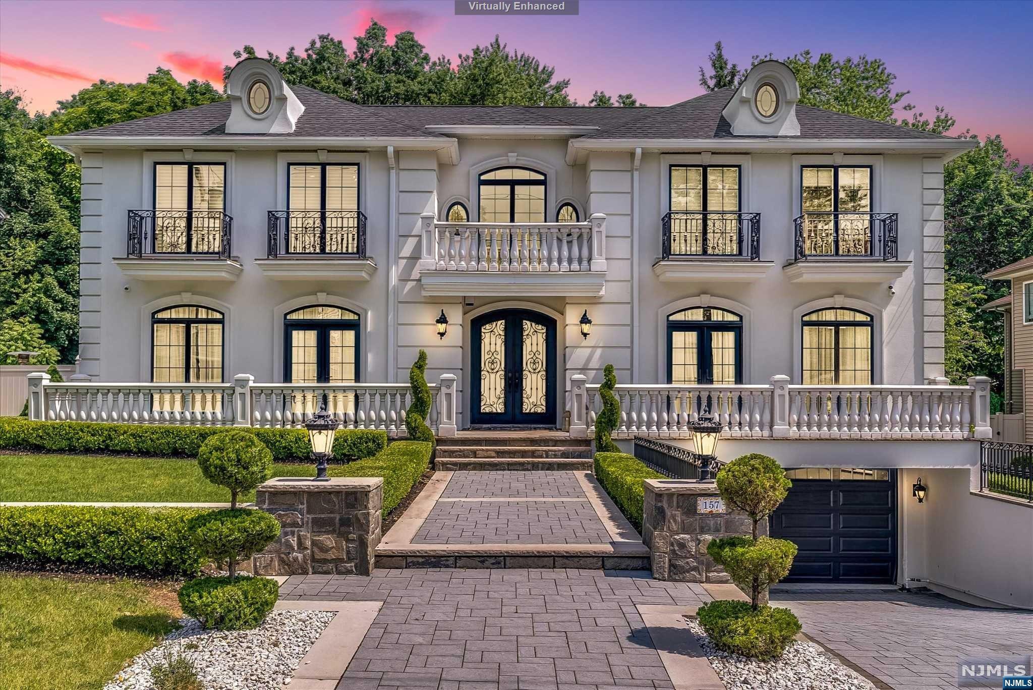 Stunning,luxurious one of a kind custom-designed colonial home built in 0217 features 5 bedrooms,5 full baths and a finished walkout ground floor. Upon entering you will find a unique curved-style living room with ceiling to floor windows that make the entire home bright and sunny.The gourmet eat-in kitchen offers custom cabinetry, center island and premium luxury appliances. Also on the first floor a spacious gorgeous dining room, a home office or a guest room, a full bath and a family room with a fireplace. Second floor features professionally designed Primary bedroom with accent wall, primary full bath with glass shower and a stand-alone tub and a walk-in closet. Also on the second floor:junior suite, two other bedrooms a full bath and a laundry room. The walk out ground floor has an additional room that can be used as a gym, a full bath and two car garage. Located on a beautifully manicured property, in prime Paramus location near schools,parks and NYC transportation.