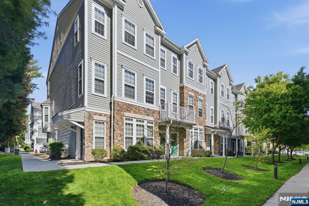 Nestled in the desirable community of Garfield, this charming 2-bedroom apartment offers the perfect blend of comfort, convenience, and modern living. Featuring 2 full baths and a 1-car garage, this well-designed home provides a functional layout ideal for homeowners and investors alike. The first floor welcomes you with a bright foyer leading into a spacious living room, a well-appointed kitchen, and an additional bath for added convenience. Upstairs, the second floor features two generously sized bedrooms, another full bath, and a versatile utility room perfect for storage or laundry needs. Ideally situated just minutes from NYC-bound transportation, major highways, shopping, dining, and highly rated schools, this property offers commuters an easy lifestyle while maintaining the comfort of a peaceful residential setting. Whether you are looking for your first home or a smart investment opportunity, this apartment delivers exceptional value in a prime location.