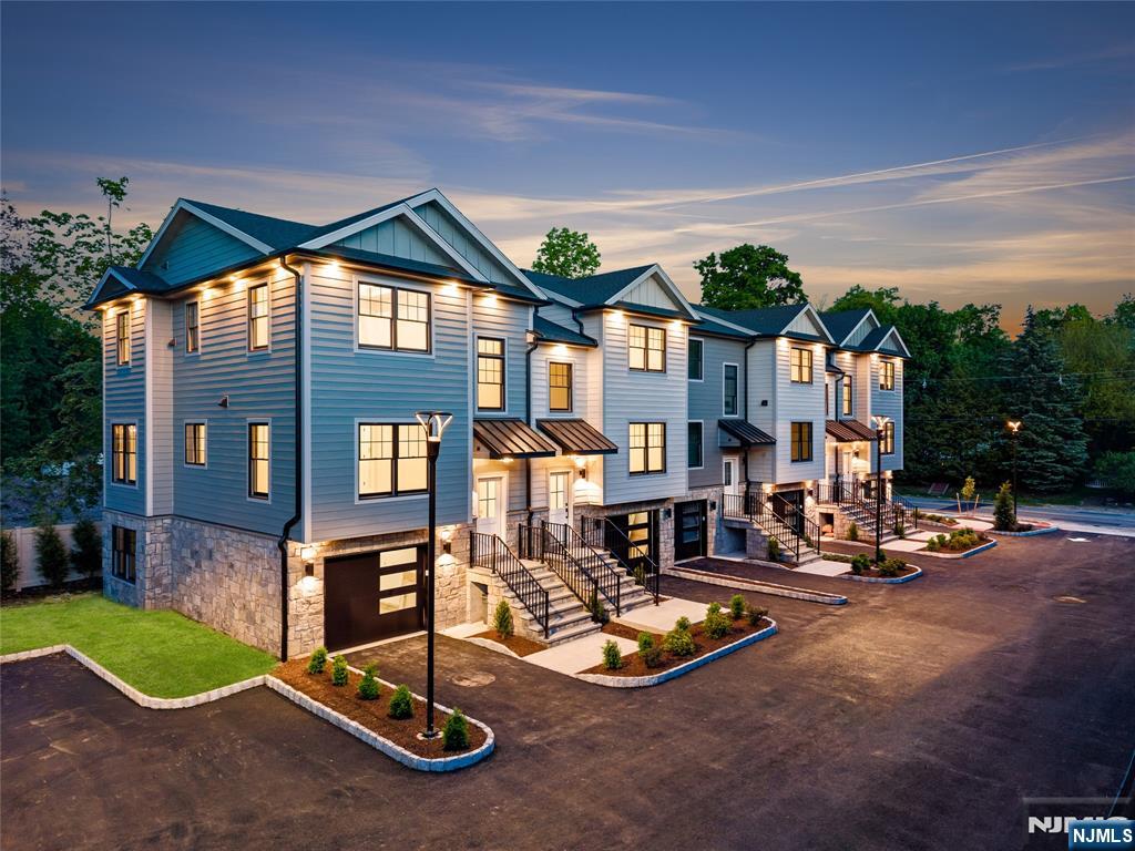 Presenting Midland Park's most prestigious new construction townhomes - 72 Lake - 5 townhomes located on the cusp of coveted Ridgewood! These High-end luxury townhomes available with an expected delivery of August 2026 with the potential sale of some of the townhomes! The townhomes are approximately 2,000 sqft each and centrally located to everything including walking distance to both Midland Park town center shopping, restaurants, Starbucks AND Downtown Ridgewood including the train for NYC commuters, shopping, bars and restaurants. Website with more details is 72LAKE.com including amenities, floorplans, 3D virtual tours and overviews. Each townhome will have the same or similar finishes, appliance packages, etc as the Model Unit. The townhomes have their own private rear yards, patios, 1 car garages. Owner holds NJREL