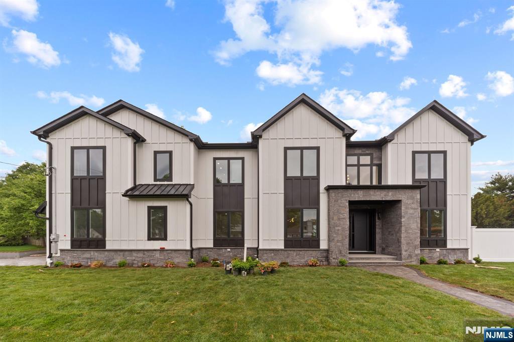 Discover unparalleled elegance in this brand-new construction masterpiece situated on an oversized lot in one of Paramusâ€™ most desirable neighborhoods. Spanning approximately 8,500 square feet across all levels, this stunning home offers sophisticated living with high-end finishes throughout. Step into a dramatic 20-foot luxury foyer that sets the tone for grandeur. The expansive first floor features a large family room with a cozy fireplace, perfect for entertaining, and a chefâ€™s dream kitchen equipped with premium Thermador appliances, generous counter space, and a large island. A convenient guest bedroom with a full bathroom completes the first level. Upstairs, the second floor boasts four oversized bedrooms, each paired with its own luxurious bathroom. The fully finished 10 feet basement is an entertainerâ€™s paradise, offering a spacious recreation room, dedicated media room, an additional bedroom, and a private gym with saunaâ€”ideal for wellness and relaxation. Additional highlights include a 3-car garage with an impressive 14-foot ceiling height and a expansive oversized lot with plenty of room to add a pool and create your ultimate outdoor oasis. This exceptional home seamlessly blends modern luxury with everyday comfort. Donâ€™t miss the opportunity to make 317 Edstan Way your own