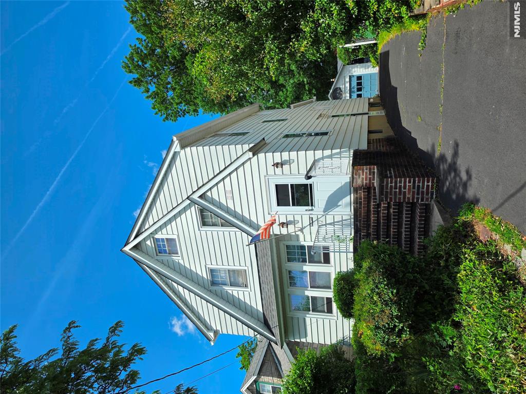 Come see this classic colonial. Boasts original ribbon oak floors accented with original chestnut woodwork. Large and separate living and dining rooms that are great for entertaining. The eat in kitchen can be used for any other occasion. Sits on a quiet dead end street in the beautiful Brookside Section. The long private driveway leads to a manicured private yard and detached garage. The yard can also be accessed from the large partially finished walkout basement.