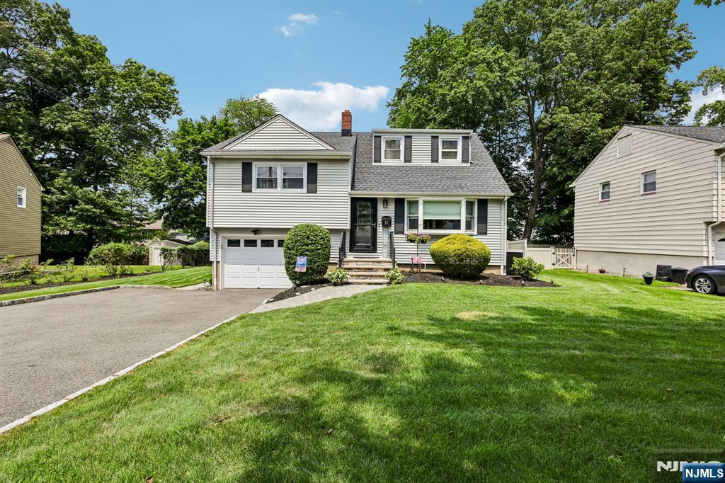 Move right into this beautifully renovated and meticulously maintained 3 bedroom, 2.5 bath, split-level home, nestled on a quiet, highly desirable dead-end street offering minimal traffic, added privacy, and a peaceful neighborhood setting. The stunning eat-in kitchen features a freestanding island with breakfast bar, granite countertops, spacious pantry, and premium GE Cafe appliances, including a double oven and 6-burner cooktop, perfect for everyday living and effortless entertaining. The sun-filled main level offers a bright and inviting living room, a formal dining room, and fully accessible full bath with walk-in shower. Upstairs, the spacious primary bedroom & two additional bedrooms are complemented by a newly renovated bathroom which showcases stylish, modern finishes and exceptional comfort. The finished basement expands the living space with a cozy family room/den & separate home office, ideal for today's flexible lifestyle. Additional highlights include two-zone heating and cooling, newer roof, newer windows, updated insulation, new deck, underground sprinklers, French drains, water-powered sump pump & house alarm system. Ideally located just minutes from Verona's top-rated schools, parks, restaurants, shopping, convenient NYC transportation and the popular, Verona Community Pool. This exceptional home truly has it all! Don't miss this incredible opportunity, schedule your private showing today!