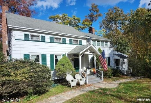 Welcome to West Caldwell and its highly sought-after neighborhood. This Colonial-style home features 3 bedrooms, 2.5 baths, and timeless old-world charm. Situated on .74 beautiful acres with a serene brook running along the back, this property offers a rare opportunity with significant upside potential. The home includes a *(rear) garage and a front driveway, providing ample off-street parking