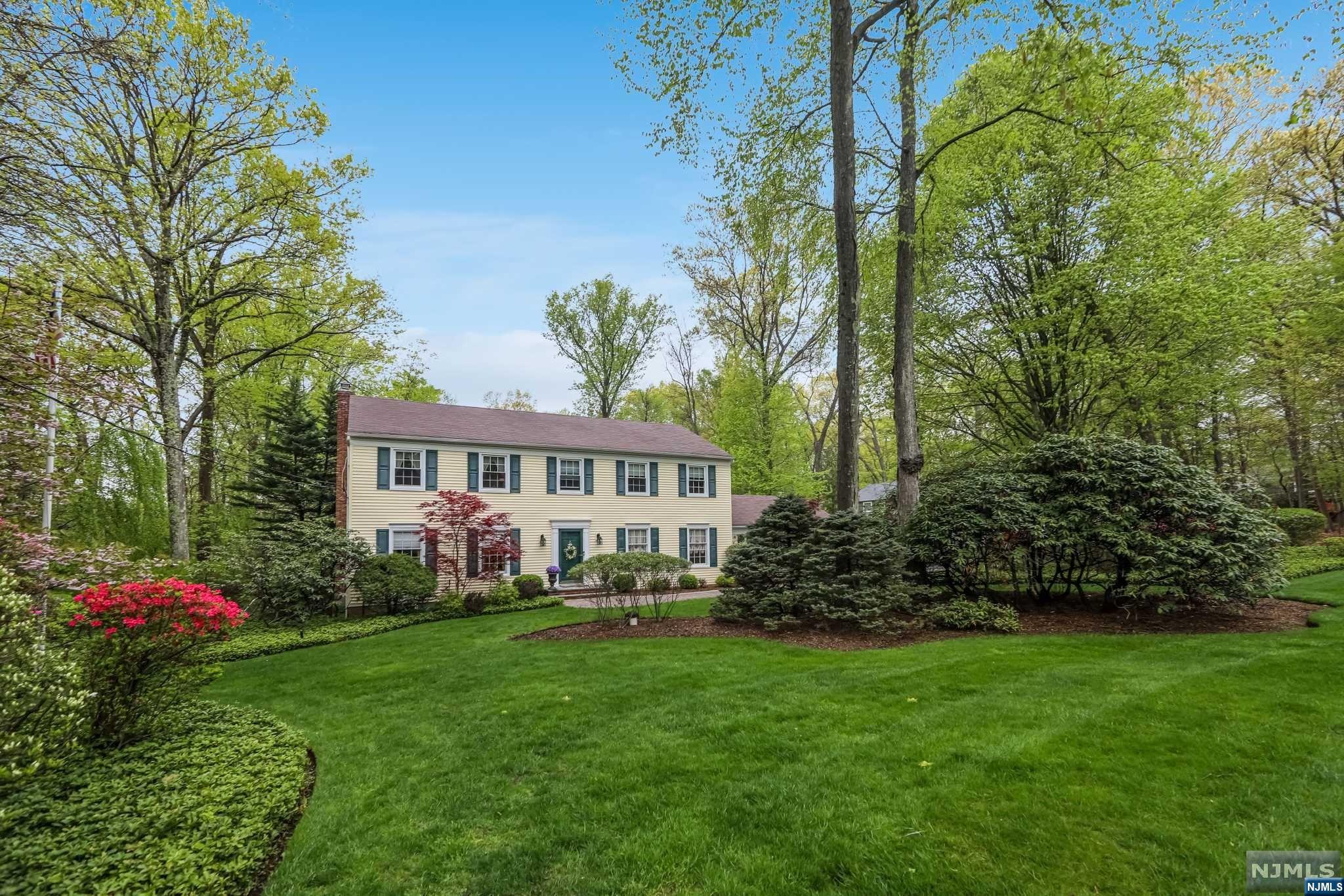 Prime location....'Anona Park' section of Upper Saddle River sits this lovely 4 bedroom home with newer, well equipped kitchen featuring granite counters, upgraded appliances, center island, desk area, eating area with French doors leading to deck. This home boasts hardwood floors, plenty of windows, mud room, open huge great room with fireplace & French doors leading to the outdoor oasis, The lush park like fenced property boasts heated gunite pool with waterfall hot tub, custom stamped concrete patio, speakers, outdoor lighting, cabana & open space to roam. Retreat upstairs to the spacious bedrooms w/primary bedroom with private bath & dressing area, large hall bath with double vanity & 3 additional bedrooms, all with plenty of closets. The lower level is finished with a family room, office, utility & storage room. The 'Anona Park' lifestyle offers a swimming lake, tennis, basketball, club house & community events. Come fall in love!