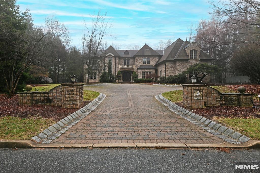 CUSTOM BUILT 8700 SQ FT HOME ON QUIET CUL DE SAC. HOME FEATURES ON FIRST FLOOR A GRAND FOYER, WINDING STAIRCASE, CHERRY WOOD CUSTOM OFFICE, GUEST SUITE WITH FULL BATHROOM, LUX KITCHEN, GREAT RM, BANQUET DINING ROOM, BUTLER PANTRY AND 3 CAR GARAGE. SECOND FLOOR IS THE PRIMARY SUITE, AND 3 ADDITIONAL BR, A LARGE BONUS ROOM COMPLETES SECOND FLOOR. THE FULLY FINISHED BASEMENT FEATURES CUSTOM WINE CELLAR, FULL SIZED COMMERCIAL BAR, HOME GYM AND THEATRE AND FULL BATHROOM. REAR YARD INCLUDES RESORT SIZED HOT TUB WITH POOL HOUSE.