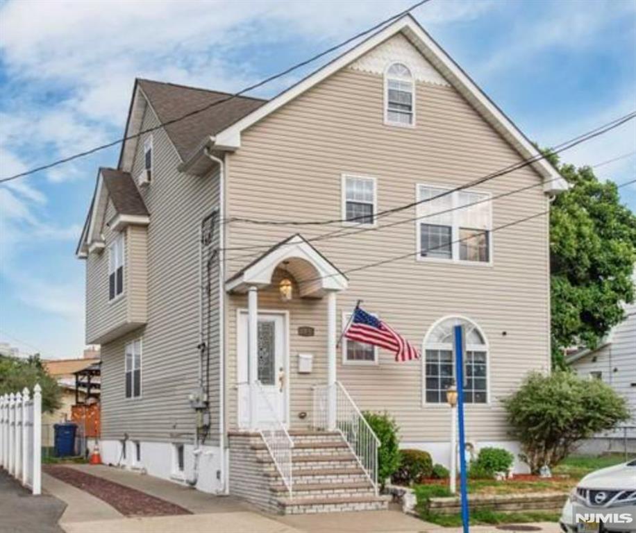 Beautiful and young 2-family home in the heart of booming Hackensackexpress NYC transit on the corner of street. Many stores and restaurents nearby.Spacious kitchen and livingroom ,2bedrooms with 2fullbath and Washer/Dryer in unit. familyroom at the basement can be used as a room. You must see it NO PETS ARE ALLOWED. Parking space .