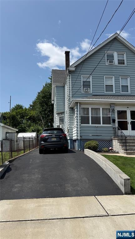 Well-maintained 1/2 duplex featuring 4 spacious bedrooms and 2 full bathrooms, providing the perfect combination of comfort and functionality. First floor features a bright open concept inviting living room, formal dining room and a well-appointed kitchen with plenty of cabinets and counter space. Finished basement with a full bathroom, office area, and laundry room. Parking for 2 cars. Physical address is 1 Guenther Pl
