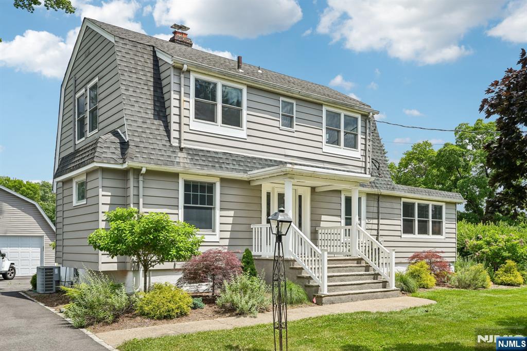 Welcome to this beautifully maintained Colonial situated on an expansive property in one of Fairfield's most desirable neighborhoods. Boasting outstanding curb appeal and a bright, inviting interior, this home offers a spacious floor plan enhanced by gleaming hardwood floors, abundant natural light, and tasteful modern finishes throughout. The main level features a generous Living Room with a decorative stone fireplace, a formal Dining Room, and an updated Kitchen with white cabinetry, granite countertops, stainless steel appliances, and ample workspace for everyday living and entertaining. A convenient Powder Room and oversized Laundry Room with plenty of storage complete the first floor. Master Bedroom offers a walk-in closet and Master Bath, while the second floor includes three additional Bedrooms and an updated full Bath. The fully finished Basement provides versatile living space ideal for a Family Room, Recreation Area, Home Office, Gym, or Playroom. Recent improvements include a newer roof, Anderson tilt-in windows, doors, driveway, and backyard paver patio, along with heating and central air systems that are approximately four years old. Additional highlights include a detached 2 car Garage and a spacious backyard perfect for relaxing or entertaining. Located near Fairfield's renowned recreation complex, shopping, dining, major roadways, and NYC transportation, this move-in-ready home combines space, comfort, and convenience in an exceptional location.