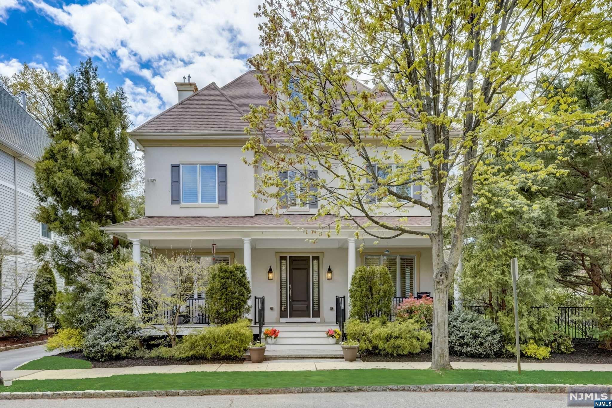 Gorgeous French provincial-style colonial in the best location w/ peaceful and private corner side yard minutes from iconic Watchung Plaza & NYC train! This 5BR/4.5BA custom-built (2006) luxury home blends timeless architectural beauty w/ the finest amenities and modern conveniences. Elegant 2-story grand foyer, 10ft. ceilings throughout, and chef's kitchen overlooking LR w/ gas fireplace and French doors that lead to a custom paver patio. Music room, powder room, butler's pantry, laundry room, mudroom, den, and dining area off the gourmet kitchen on 1st FL. 2nd FL has 2 bedrooms w/ walk-in closets & private en suite bathrooms, and expansive Primary Suite w/ fireplace, spacious walk-in closet, and luxurious en suite bath w/ radiant heat floors & soaking tub. 3rd FL has family room w/ high ceilings & skylight, 2BRs & 1BA. Elevator to all levels, Pella windows, countless upgrades, and large, fenced backyard oasis w/ 2nd custom paver patio. Meticulously maintained & loved for years!