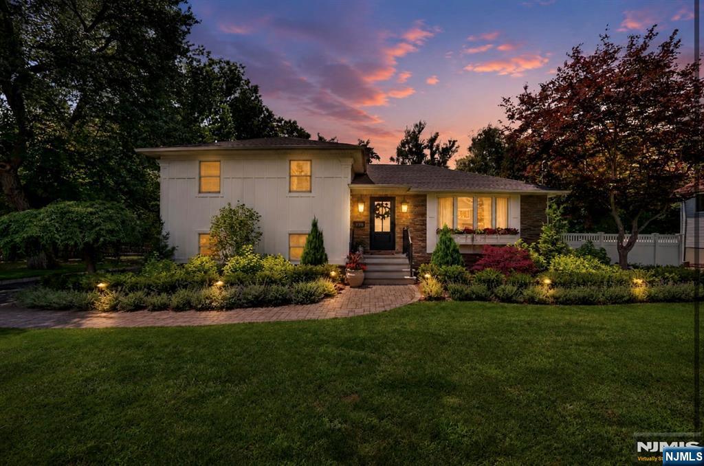 Prime location! Immaculate home on over a half acre situated on a quiet cul-de-sac street in the heart of Washington Twp., Bergen County. Luxury, convenience and comfort await you through the stunning stone entrance. The first floor open-concept features a spacious living room & dining area. Gorgeous Chefâ€™s Kitchen with custom cabinetry, quartz countertops with oversized center island and s/s appliances including Viking Range. Hardwood floors throughout. 2nd floor with 3 bedrooms and full bath with stylish subway tile. Lower level with large rec room, gas fireplace and sliders to paver patio. Finished basement with laundry, office/den and living area perfect for entertaining. Your fenced-in private backyard oasis awaits you. Live like youâ€™re in a resort every day! Extensive paver patio with multiple areas to entertain or just relax. A stunning waterfall is the backdrop to your heated in-ground pool. Bonuses include an attached garage with epoxy floors and an extended driveway to accommodate multiple vehicles, sprinklers with pristine landscaping as well as newer roof, windows and siding. Located in a highly desirable neighborhood near top-rated schools, dining, parks, premier shopping, houses of worship and major highways makes this the perfect location that checks every box.