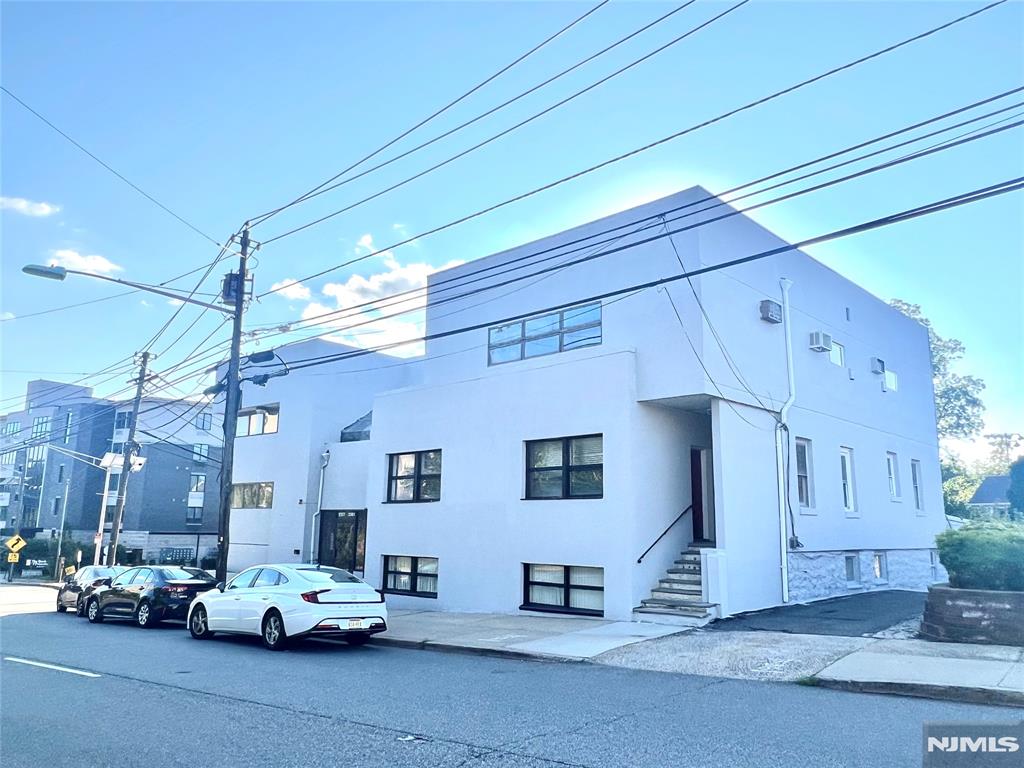 For Lease : Fort Lee, NJ (Unit 1, Ground Floor) , Spacious office opportunity with approx 2,200 sqft of flexible space in a prime Fort Lee location. The layout includes multiple private rooms, making it well-suited for professional offices, creative teams, or businesses that require both individual workspaces and collaborative areas. The unit is accessed a few steps down from the building interior, but also features its own private exterior entrance, providing convenient direct access for clients and staff. Located just minutes from the George Washington Bridge and New York City, this property offers outstanding connectivity. It is close to Fort Leeâ€™s Main Street as well as major highways including I-95, Route 4, and the Palisades Interstate Parkway, ensuring easy access for both local and regional traffic. With generous square footage, versatile configuration, and excellent transportation links, this unit offers the perfect balance of accessibility, privacy, and functionality for a growing business.