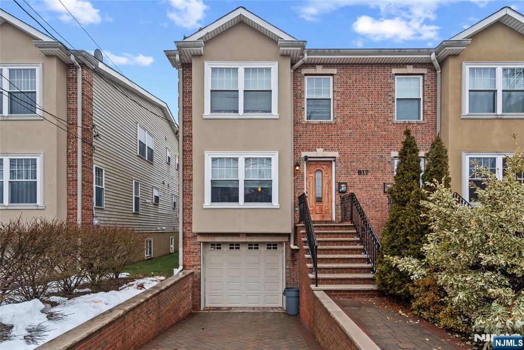 Welcome to this beautifully maintained newer construction home in Secaucus offering approximately 4,000 sq. ft. of living space, 4 bedrooms, and 3.5 bathrooms. Built in 2011, this spacious residence combines modern design, quality upgrades, and an ideal layout for everyday living and entertaining. Step inside to an open-concept floor plan filled with natural light and enhanced by hardwood floors and crown moldings throughout. The main living area flows seamlessly into the dining space and kitchen, creating a comfortable setting for gatherings and daily living. The home features generously sized bedrooms, including a primary suite with a private en-suite bathroom that provides a peaceful retreat. The fully finished lower level includes an additional bedroom and full bathroom, ideal for guests, extended living, or flexible use as a home gym, office, recreation room, or media space. Recent upgrades include a new HVAC system, furnace, and hot water heater. Enjoy a private backyard perfect for relaxing or entertaining. With no HOA fees and convenient access to New York City transportation, major highways, parks, restaurants, and shopping, this home offers the perfect blend of suburban space and commuter convenience.