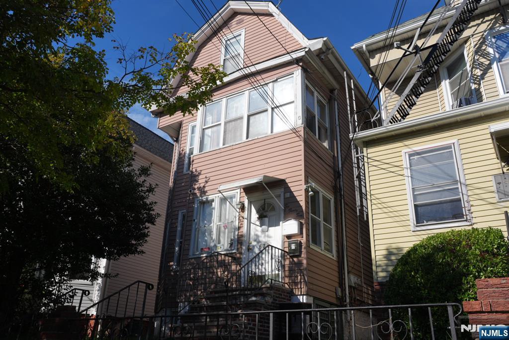 Large Two family home with six bedrooms and four Bathrooms , Finished attic, Finished basement. Large Backyard- great space for entertainment -Great investment Property - Close to NYC transportation . Large two family home with six bedrooms and four Bathrooms , Finished attic, Finished basement. Large Backyard - great space for entertainment -Great investment Property - Close to NYC transportation . Street Parking