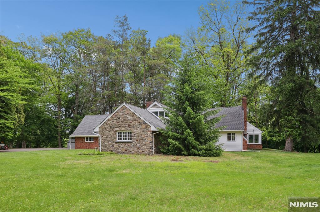 Rare opportunity !!!! Over 1.3 acre of leveled lot! Expanded ranch with 5 bedrooms and 3 bathrooms. First floor has entry foyer, living room with fireplace, then, kitchen, laundry, utility, two car garage, primary suite with full bath, bedroom, full bath. Second floor has three bedrooms and a full bath, access to walk-in attic. 6 years old roof. Located on a dead end street. for further information, please text or call the listing agent at 201-566-5353