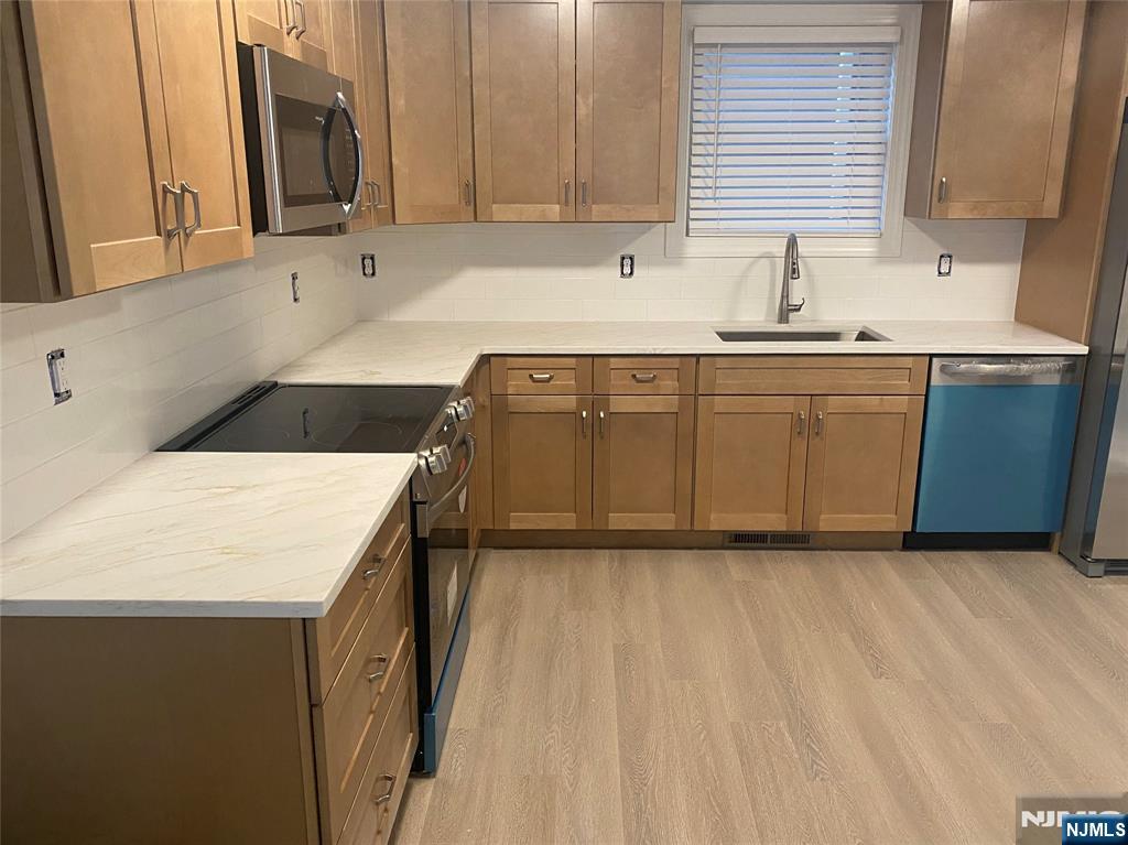 BRAND NEW! Just renovated 2 Bed/1 Bath apartment moments away from downtown Morristown. New Bathroom and Kitchen w/Stainless Steel appliances, granite counter tops, washer/dryer in unit, private deck, huge backyard, and more. Close to Restaurants, Cafes, Bars, Schools, Parks, and Transportation this one won't last!