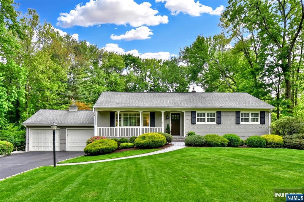 Location, Location, Location! Located in the very desirable East Hill neighborhood in Upper Saddle River, this house cannot be missed! The EF has hardwood floors & goes into a beautiful and bright FLR w/ parquet hardwood floors, crown molding, & a large window. The FDR also has parquet floors, crown molding, & a large window. The charming kitchen has stainless steel appliances - Bosch dishwasher, Samsung gas stove, and Sub-Zero fridge - and a skylight for an abundance of natural light. Open to the kitchen is a FamRm w/ wood-burning fireplace, hardwood floors, sliders to the deck, & a bay window. The spacious primary offers hardwood floors, a walk-in closet, and en-suite w/ a shower stall and vanity sink. There are 2 additional BedRms - both w/ hardwood floors - and the main hall bathroom w/ a tub and double vanity. There are also several closets - both linen & coat closets - so you have plenty of room for storage. The basement is full and mostly finished. There is a great wet-bar, 2 cedar closets, garage access, laundry, and plenty of storage! It is walk-out to your very private and oasis-like backyard. There is a lovely Ipe deck (Ipe is known to be one of the most durable woods)! You also have a paver patio... you will have more than enough room to host your friends and family! Enjoy your time in the large pool. Liner is only 2 years young and the filter is 4/5 years. This home has so much to offer! Room to entertain and a great location! Make your appointment today!