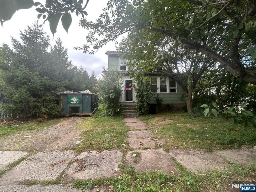Great opportunity to remodel this 3 bedroom 1 bath house with long driveway and massive backyard. Living Room, Sitting Room, Dining Room and Kitchen on first floor with a sun room in the rear facing the spacious backyard. 3 bedrooms and 1 bath on the second floor with pull down stairs to the attic for extra storage. Finally, the basement has tall ceilings with a walkout door! Heat is Radiant steam. Bring your creativity and make this property yours today! Being sold completely As-Is, Buyer is responsible for any/all town certificates. The property will not pass traditional financing in its current state. Cash offers or Alternative financing only. Property is in a flood zone.