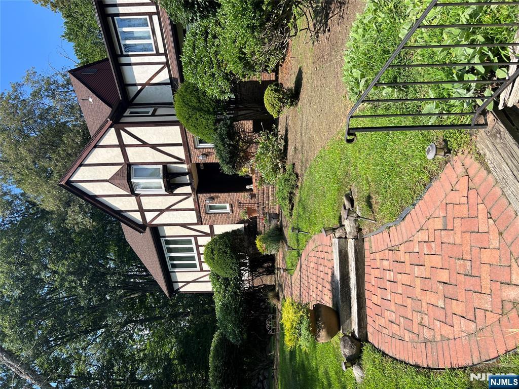 Lux Living in Prestigious area on Private Cul De Sac. Brick/Stucco 12 room, 5 bedrooms, 4.5bath, Center Hall Colonial minutes from Town Center. Featuring granite Entry Hall, King Size Sunken Family Room w/wood burning Fireplace. Updated EIK w/Viking and Sub Zero appliances, plus 2nd Butler's kitchen. Huge Dining Room (seats 18) w/ slide doors to Deck, LR, Sun Room w/Sky Lites, Ground floor large Office/Den, 5th BR, Full Bath, Lndy Room. Bonus 4 Car Detached Garage. Central Vac, New Roof, 2nd floor feat: 4 Bedrooms, 3 full baths, Jacuzzi, Walk-in Closets. Listing Broker holds NJ Real Estate License.