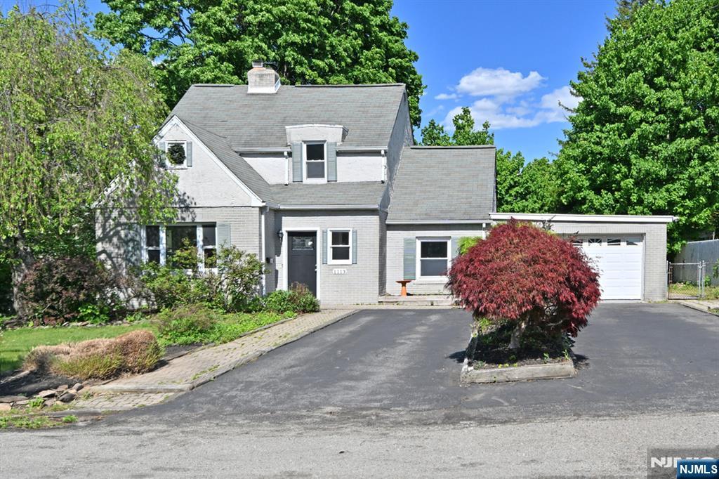 Charming curb appeal welcomes you to this beautifully maintained 3-bedroom, 2-bath Colonial nestled in one of Boontonâ€™s desirable tree-lined neighborhoods. The first floor features a modern kitchen with stainless steel appliances, a separate dining area, and a formal living room with a cozy fireplace. A spacious first-floor bedroom and full bath offer added convenience and flexibility. Upstairs, youâ€™ll find two additional bedrooms along with a versatile bonus room perfect for a home office, nursery, or den. The partially finished basement provides ample extra living and recreation space. Step outside to enjoy a massive deck ideal for entertaining, BBQs, and outdoor living, along with a beautifully lush landscaped yard filled with mature plantings. Complete with a one-car attached garage and an excellent commuter-friendly location, this home offers the perfect blend of charm, comfort, and convenience.