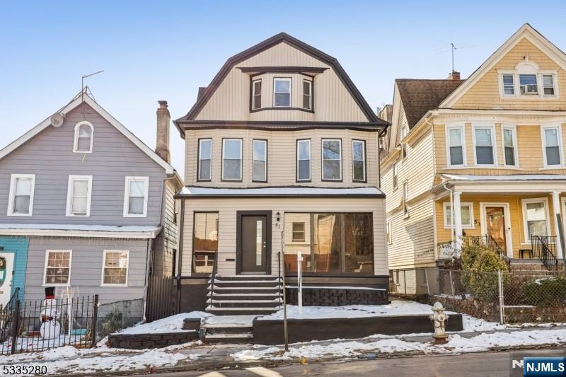 Beautiful large newly renovated single family home on a quiet street. Lovely curb appeal with custom entrance door and inside railings, open floor plan with fireplace in the dining room. Outstanding Kitchen with state of the arts appliances, custom quartz counter-tops. Finished basement with full bath and washer/dryer attachment. Parking in the back of the house. Near all public transportation and Highways.