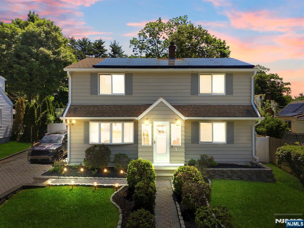 Situated just blocks away from the Livingston border sits this renovated colonial boasting 5 bedrooms 2 bathrooms, over 1800+ sq ft of living space all situated on an oversize lot. The first floor features a large living room with plenty of natural light, 2 large bedrooms perfect for guest room or first floor office and a full bathroom. At the heart of the first floor sits the fully renovated eat in kitchen with quartz countertops, large center island, and a breakfast bar. Boasting brand new cabinets, backsplash and appliances, this is the kind of kitchen you never want to leave. Upstairs you will find three large bedrooms including an oversized primary bedroom large enough for a home office and another renovated bathroom. The full basement is partially finished and provides endless possibilities for a home theatre, bar area, game room and much more. The backyard spans nearly half a football field and is the perfect opportunity to create an oasis you never have to leave. Additional features include forced hot air & central ac cooling, solar panels, and a large 2 car width driveway. The home is walking distance to Mount Pleasant elementary & Liberty middle school. Come see everything West Orange has to offer and why its one of the hottest towns in NJ.