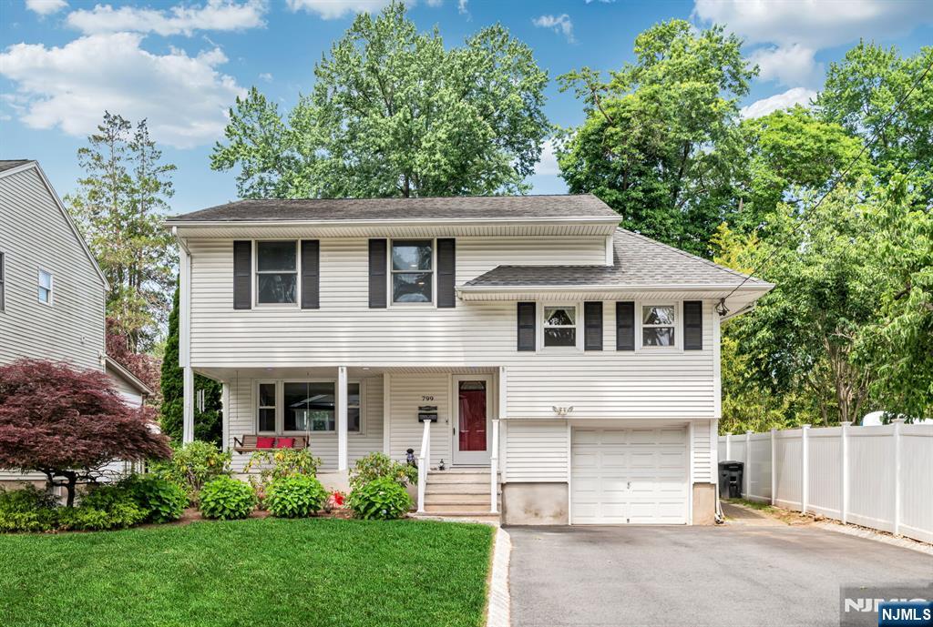 You can truly have it all. Situated in a coveted River Edge location, this move-in ready Tri-level house perfectly balances modern updates with an inviting, generous layout. From the moment you step onto the charming front porch, youâ€™ll feel right at home. Inside, the 2,100 square feet of living space (plus a finished basement) is bathed in natural light. The spacious living room flows effortlessly into the dining area and a beautifully renovated kitchen, creating a seamless heart of the home thatâ€™s ideal for both daily life and hosting friends. The second level offers two bright bedrooms and a full bath, but the real showstopper is the expansive primary suite. Measuring an incredible 21.5 x 25.4, this private retreat features a dedicated office space, a full bathroom, and access to a walk-up attic for effortless storage. Need more space? The lower level includes a convenient laundry room and access to the one-car garage, while the finished basement provides a versatile recreation area, additional storage, and another full bathroom. Outside, the property continues to impress with a 12x14 Shed with loft, power and is ready for a whole house generator, Fabulous flat backyard with a spacious patio and fire-pit are designed for summer gatherings, relaxation and outdoor dining. Located just moments from top-rated schools, local parks, and easy transportation options, this home offers the lifestyle youâ€™ve been searching for. Welcome home!