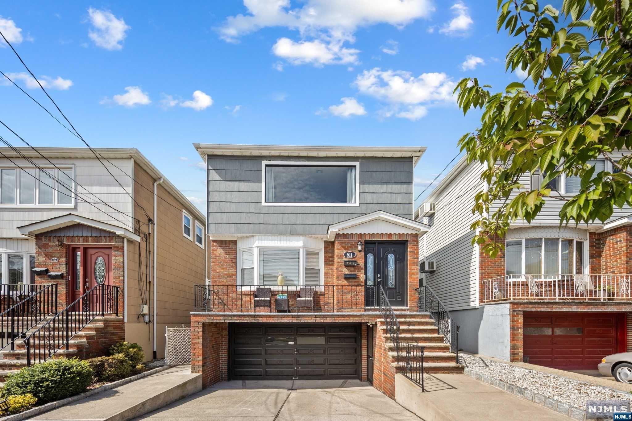 Great 2-family home in Kearny, New Jersey! This wonderful 2-family home was completely renovated in 2022 Unit 1 has 3 bedrooms, 1 1/2 bath, modern open space for you to enjoy a great kitchen, living room, dining room, finished ground floor basement with washer and dryer, 2 car garage, and back yard. Unit 2 has 3 bedrooms, 2 bathrooms, modern open space for you to enjoy a great kitchen, living room, dining room, washer and dryer inside the unit, Central air. The basement is a ground floor with a walkout entrance, totally finished with a full bathroom and utility room, Attached 2 car garage Come check it out and make it your home.