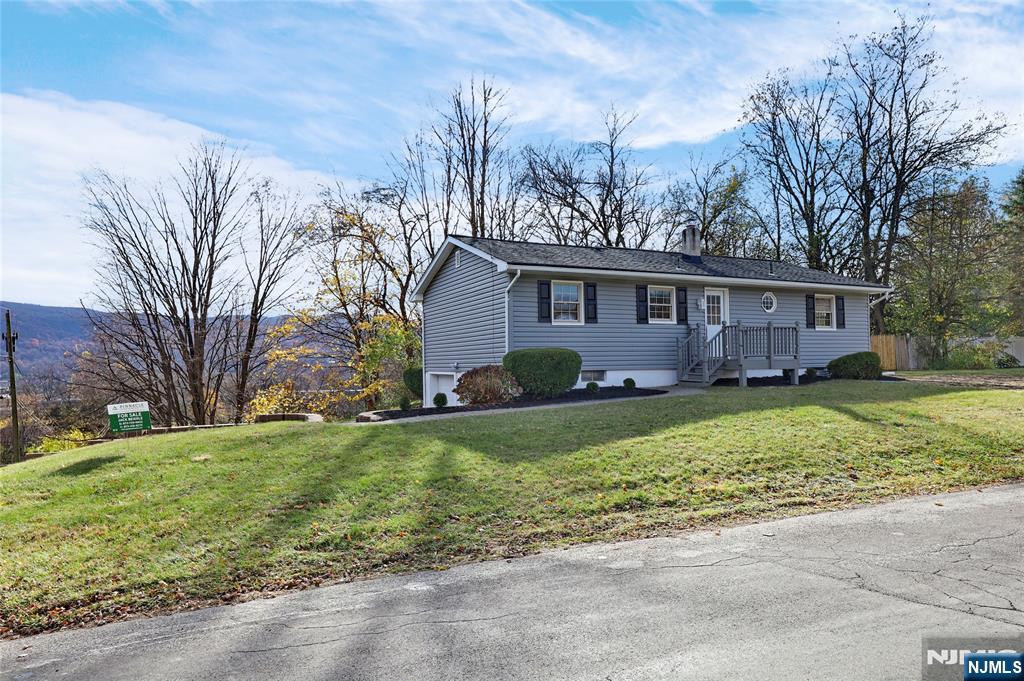 Welcome to 6 Van Buren Ave in Vernon, NJ, a beautifully updated and truly move-in-ready home offering modern finishes, fresh living spaces, and important system upgrades. This charming 3-bedroom ranch features easy one-level living with a bright, comfortable layout, newly finished hardwood floors, fresh paint, updated lighting, new trim, new doors, and tasteful improvements throughout. The home offers peace of mind with a brand-new high-efficiency septic system, along with a brand-new furnace and central air conditioning. The kitchen has been tastefully updated with modern cabinetry, stylish countertops, stainless steel appliances, and clean finishes. The bathroom features a fresh neutral design with updated fixtures and tile. Enjoy a refreshed exterior, a newly paved driveway, a 2-car garage, and a partially finished basement that provides additional usable space for a leisure room, office, gym, or storage. Recently renovated, tastefully decorated, and ready for its next owner, this home offers comfort, functionality, and true move-in-ready convenience..