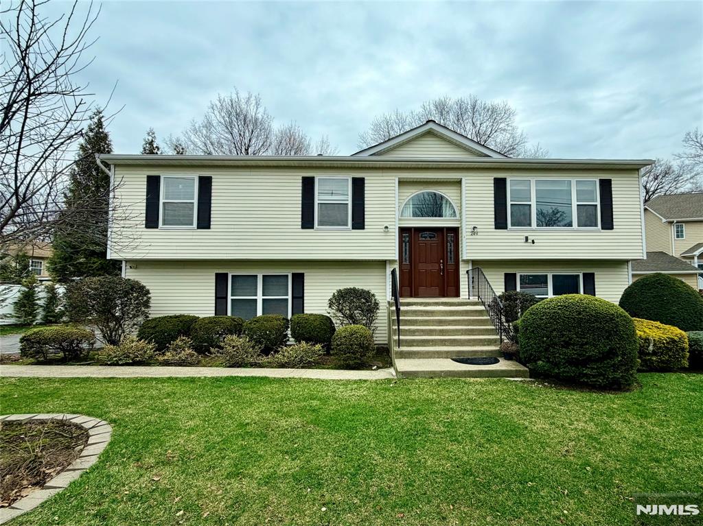 Beautifully renovated and move-in ready, this 4-bedroom, 3-bath home offers modern comfort and exceptional indoor-outdoor lifestyle. Convenient to transportation and nestled on a fully fenced, park-like property, the upper deck offers gorgeous views, while the sprawling paver patio with fire pit invites endless entertaining or simply enjoying the privacy of the lush backyard. Inside, the sun-filled main level features a renovated kitchen with granite countertops, generous cabinetry & pantry, and flows seamlessly to the living spaces & direct deck access. Large living room, formal dining room, and airy breakfast room. The bedroom wing offers a primary ensuite with private full bath, two additional bedrooms, and a full hall bath. The ground level offers flexible living with a beautiful bedroom, spacious rec room, full bath, and laundry room with storage. Additional highlights include central A/C and heating, an attached two-car garage, and ample driveway parking. Pets conditional
