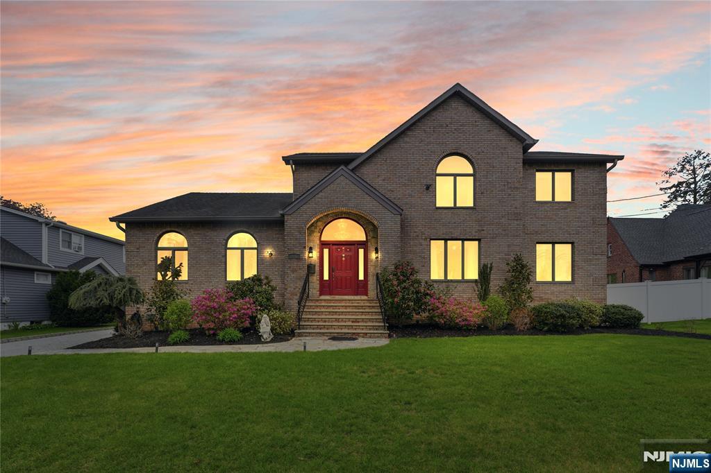 Welcome to 26 Madison Avenue, a stunning custom brick colonial nestled in one of Bergen County's most sought-after neighborhoods, approximately 12 miles from Midtown Manhattan w an easy 35-minute commute via NJ Transit or direct highway access via Route 46 and I-80. Beautifully renovated in 2024, this exceptional 4-bedroom 3-bath home offers over 12 rooms of thoughtfully designed living space. The main level dazzles with an open-concept kitchen featuring a center island, formal dining room, expansive family room and an in-law suite with a full bathroom. Upstairs, the primary suite is a true retreat with a walk-in closet and spa-style stall shower. The fully finished walk-out lower level with its own full bath, kitchenette and two additional rooms/ bedrooms offer flexible space perfect for true mother-daughter living, a guest suite or a private home office! Head outside to your own backyard oasis: a heated in-ground saltwater pool with a paver patio and deck, seamlessly accessible from the lower level for effortless indoor-outdoor entertaining. A detached 2-car garage, full-fencing and an asphalt shingle roof. Close Proximity to Hasbrouck Heights schools, minutes from local dining, shopping, major highways and so much more! This is Bergen County living at its finest. Schedule a private showing today! Don't miss this rare opportunity!