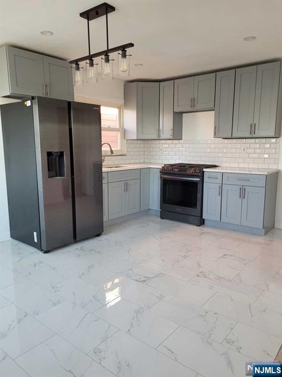Updated, bright, spacious 3 bedroom apartment in convenient location. Neutral colors, stainless steel energy efficient appliances, and modern fixtures. Laundry on premises. Rent includes one garage parking space and parking on one side of driveway. Shopping, restaurants, entertainment and several parks near by. Close to NJ Transit busses and most North Jersey Highways and George Washington Bridge access. Owner may consider one small pet.