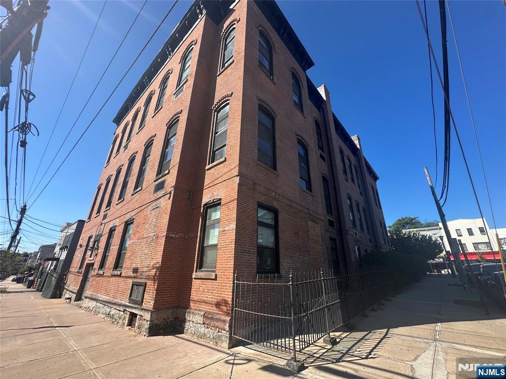 Experience life in the heart of Jersey Cityâ€™s vibrant Heights! Spacious 1 bedroom loft located in Jersey City Heights offers extremely high ceilings, over-sized windows, hardwood floors throughout, half Bath on the main floor, full bath on the bedroom floor, and open modern kitchen with breakfast island. Elevator building features recently refreshed lobby, laundry room, and hallways plus common patio. Located on Central Avenue in the heart of J.C. Heights, you'll find easy access to shopping, dining, entertainment and NYC transportation! Bus to Manhattan just outside your door or short walk to Congress elevator and easy access to Light Rail. Don't miss out on this truly unique loft style apartment in a fully renovated historic school house!