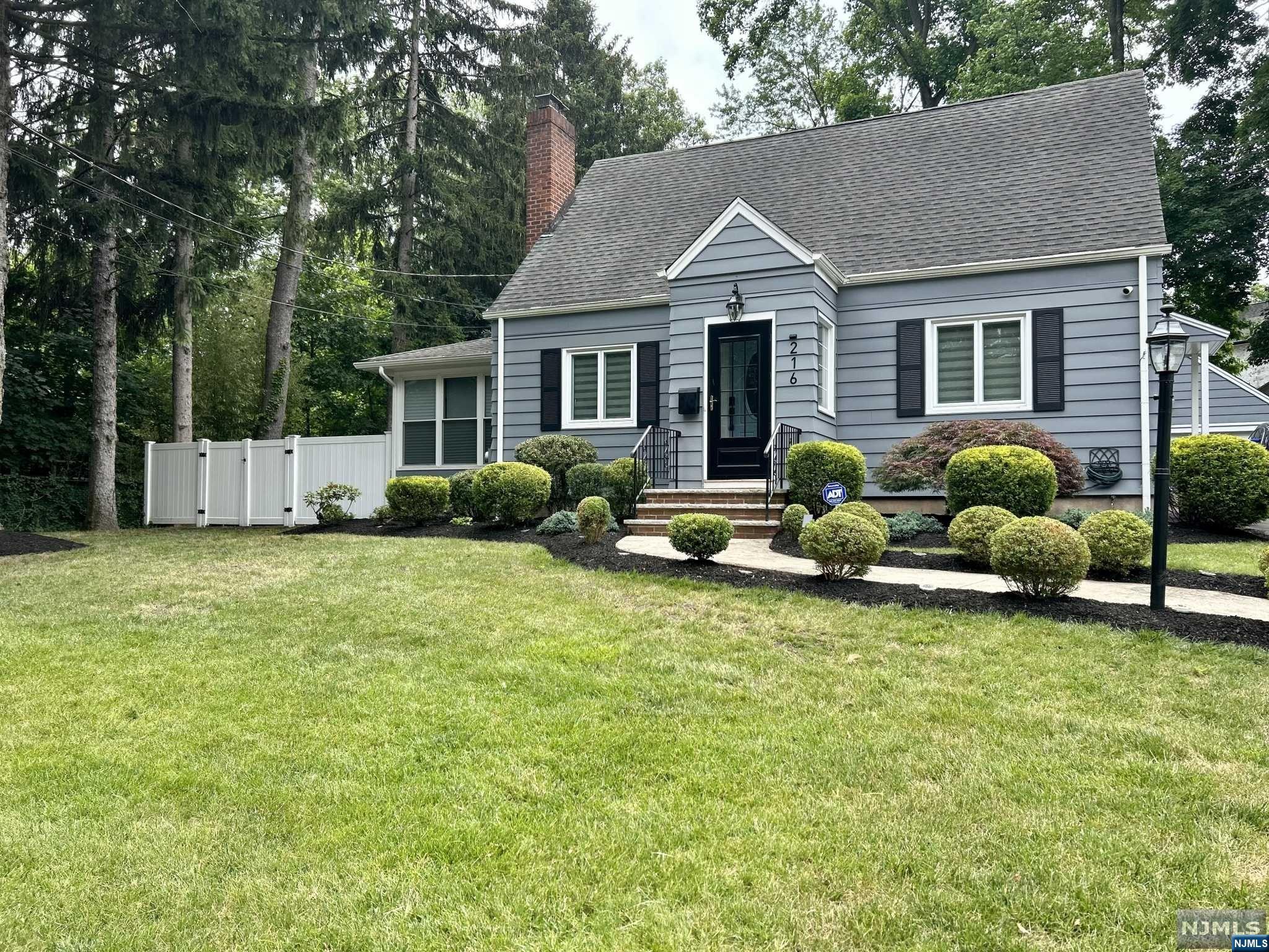 Stunning move in ready home with a great curb appeal. Modern kitchen with quartz countertop and heated floors, dining room and spacious living room with hardwood floors and fireplace. Two good size bedrooms on the first floor with a renovated bathroom. Two large bedrooms upstairs with a spacious closet, and a renovated bathroom with a bidet toilet. A finished basement will be perfect for a game room, gym or family room. Enjoy this impressive backyard with paver patio professional landscaping with a built-in sprinkler system. Priced to sell in a quiet neighborhood. Close to school, parks, restaurants, houses of worship, highways and NYC transportation.