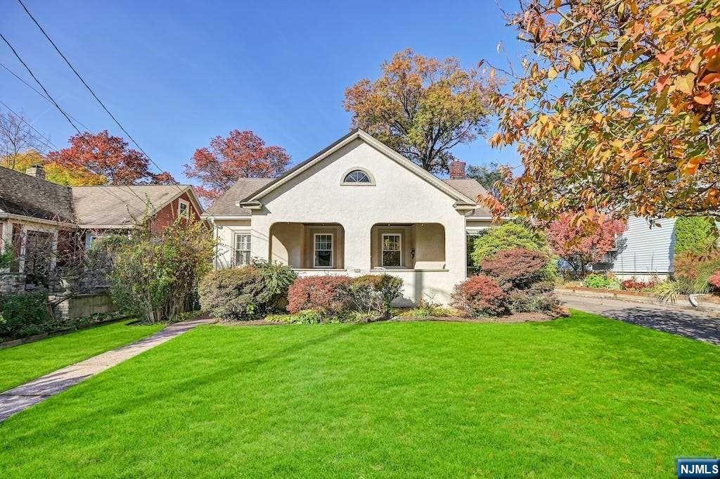 Welcome Home! Enchanting light and bright Bungalow style home located in the heart of Ridgewood. This home is just minutes from the train station, Whole Foods, Ridgewood's downtown shopping district, restaurants and schools!! Capture the beauty of Fall in Ridgewood on the front porch before walking into the sun-drenched living room with dining area. First floor includes a bright kitchen with stairs that lead to back patio and rear yard, two bedrooms as well as a hall bath and bonus room perfect for an office, or playroom! Second floor has large bedroom with additional storage room, bonus room and hallway bath. Finished lower-level rec room/playroom, laundry room, storage, and so much more...Don't miss the opportunity to call this house 'your home.'