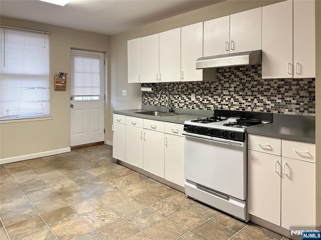 This second floor one bedroom apartment offers a convenient location in Tenafly. It features a large living room with natural light, an eat in kitchen with updated backsplash and cabinets and a full bathroom. The bedroom provides comfortable space and light and one parking space is included. Close to shopping, dining, schools and transportation, this apartment is a practical and well situated option.
