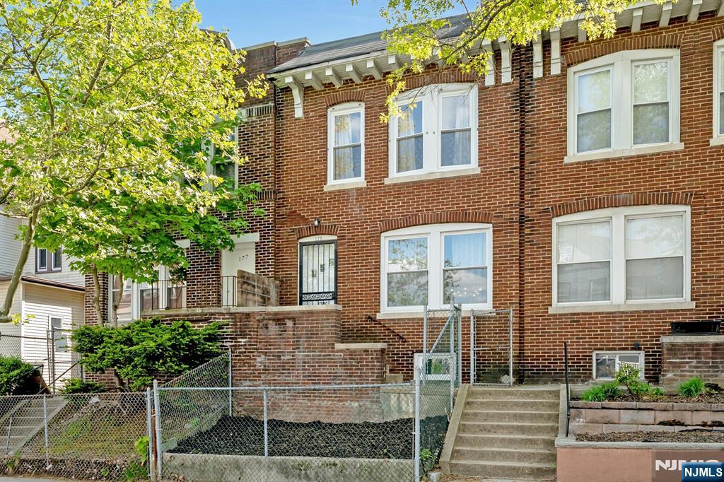 Beautifully and tastefully renovated, this 3 bedroom, 1.5 bath townhouse style brownstone offers exceptional value and true move in ready convenience. No expense was spared in the renovation, blending modern updates with timeless character throughout. The spacious layout features an eat-in kitchen, separate dining area, comfortable living room, and a dedicated office space perfect for working from home or added flexibility. Step outside to enjoy a private backyard ideal for entertaining, relaxing, or everyday use. Conveniently located close to schools, houses of worship, shopping, and major transportation, including direct access to New York City. A true turnkey opportunity just move your furniture in and enjoy. 12 month parking across the street already paid for, Seller is offering concessions towards closing cost.