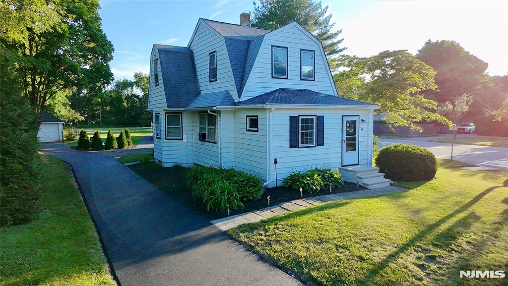 Opportunity Knocks! Welcome to this 3br/2bath custom colonial home with massive driveway. Included a brand new 4 car-carport and a detached 1 car garage on nearly a full level acre lot. The home is fully renovated and in move in condition with open kitchen/living room with 9' ceilings, natural sunlight abounds. Ideally located within walking distance of schools, Silas Park, houses of worship, multiple shopping centers and public transportation. Easy access to Rt. 23 and only 30 miles from NYC, and close to Mountain Creek and more. Home is also zoned for professional use and offers tons of parking and 2 driveways. A rare find in this price range.