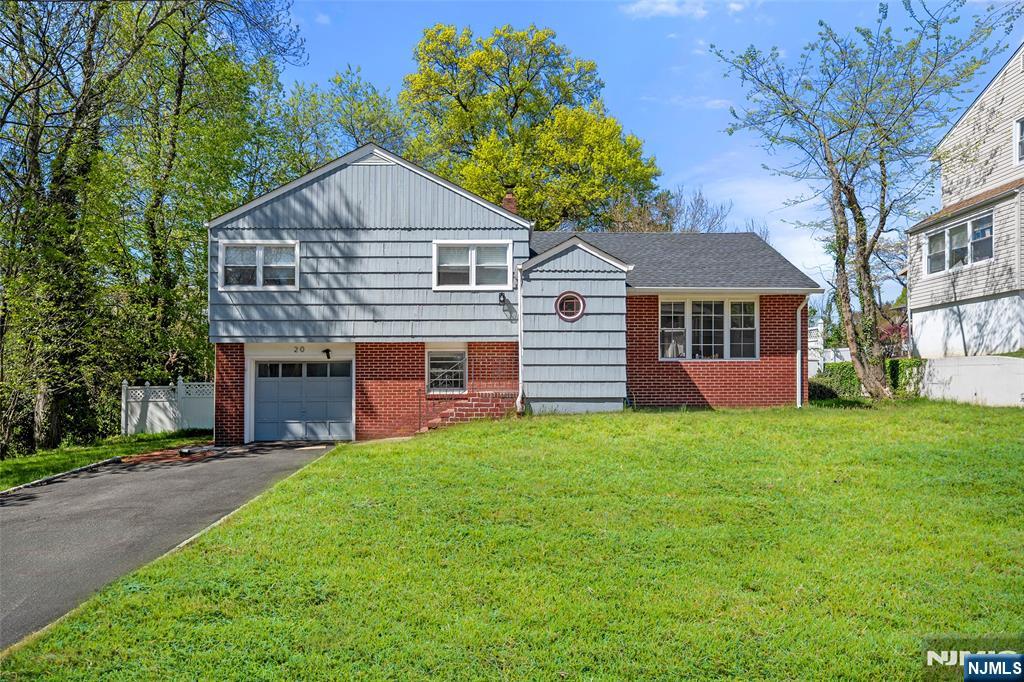 Well maintained split-level residence nestled on a quiet, desirable street. This move in ready property features two fully renovated bathrooms with modern finishes and a kitchen updated in 2022. Major updates include a newer HVAC system, windows, roof, garage and basement flooring, and recessed lighting in 2022. Enjoy a meticulously maintained pool and a spacious patio-perfect for outdoor entertaining. Smart home features add everyday convenience, and abundant natural light fills the home. A true turnkey opportunity not to be missed!