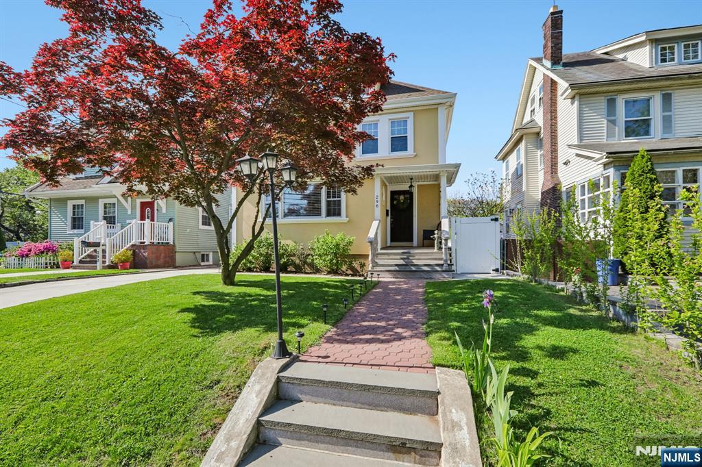 WELCOME!!!! This charming, well-maintained Colonial home is located in the sought-after Historic District of the Forest Hill section of Newark. Just blocks from Branch Brook Park, â€œThe Ballantine Gates,â€ the Cherry Blossom Center, and the Newark Light Rail Branch Brook Park Station, with an â€œEASY NYC COMMUTE.â€ This beautiful home features an inviting open floor plan designed for comfortable living and entertaining. Step into the welcoming foyer and enjoy a spacious layout filled with natural light. The modern kitchen offers granite countertops, ample cabinetry, and a sliding glass door leading to the rear deck. The main level also features a warm and inviting living room with a fireplace, along with a formal dining room perfect for gatherings and special occasions. The home offers three generously sized bedrooms, a finished attic providing additional versatile living space, and three full bathrooms. The fully finished basement includes a full bath, laundry room, utility room, and additional living space ideal for recreation, guests, a home office, or extended living arrangements. Beautiful hardwood floors run throughout the home, adding warmth and timeless character to every room. Step outside to enjoy a lovely rear deck overlooking a large fenced-in backyardâ€”perfect for entertaining, gardening, or simply relaxing outdoors. A private driveway adds everyday convenience and completes this wonderful property.