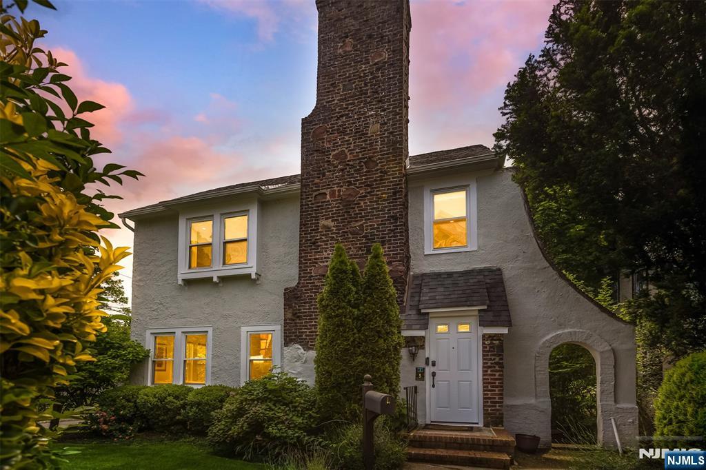 Welcome to 5 Canterbury Drive, where the charm of Montclair meets the energy of NYC. Just 3 houses from scenic Canterbury Park, this move-in-ready 4 bed Colonial offers the ideal blend of space, style, and location. A sunlit open floor plan flows across gleaming hardwood floors, leading to a renovated white kitchen with designer finishes, perfect for hosting or casual nights in. The huge primary suite is a true retreat with a spa-like en-suite and spacious closet. Three additional bedrooms offer flexibility for guests, work-from-home, or growing needs. The basement provides bonus living space, while the deck & backyard offers a quiet, green oasis just steps from the park. Set in one of Montclair's most coveted neighborhoods, this home is just minutes from downtown shops, restaurants, farmer's markets, and train access to NYC. Top-rated schools, a tight-knit community, and a dynamic arts and culture scene make this the perfect choice for buyers who want green space and community without giving up culture, creativity, or convenience.