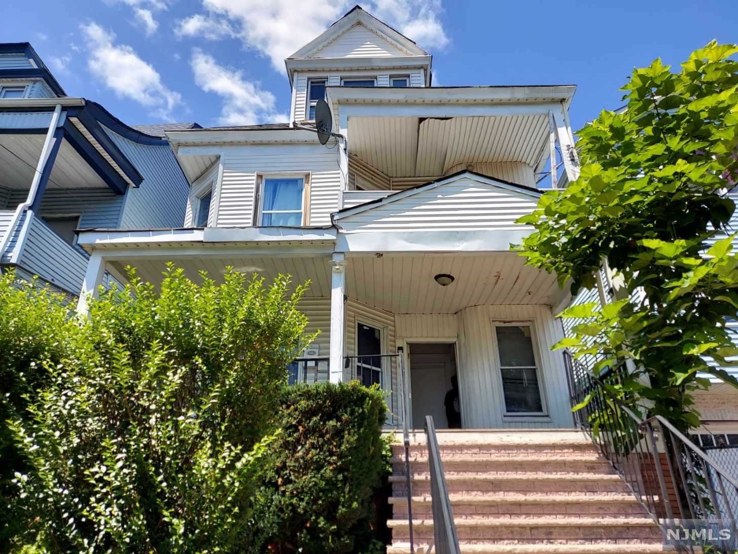 Great investment property. Open porch. 2nd Floor patio. Nice size rooms. Just a little TLC will make this home stand out. Hardwood floors. Formal dining room. Close to public transportation. Perfect commute to NYC.